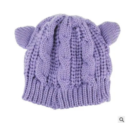 Hand made 3D knitted cat ear winter beanie in wool, shown in multiple colour options
