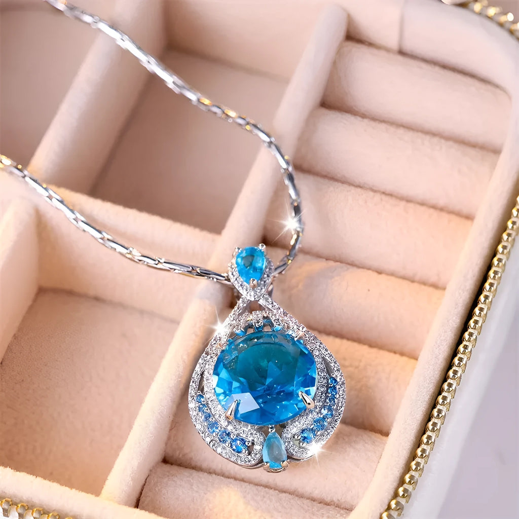 Blue fireworks-cut crystal geometric pendant necklace on water wave chain