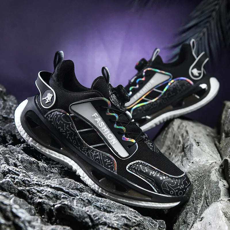 Men's low-top mesh sports shoes in solid colours with elastic band and popcorn TPU sole.