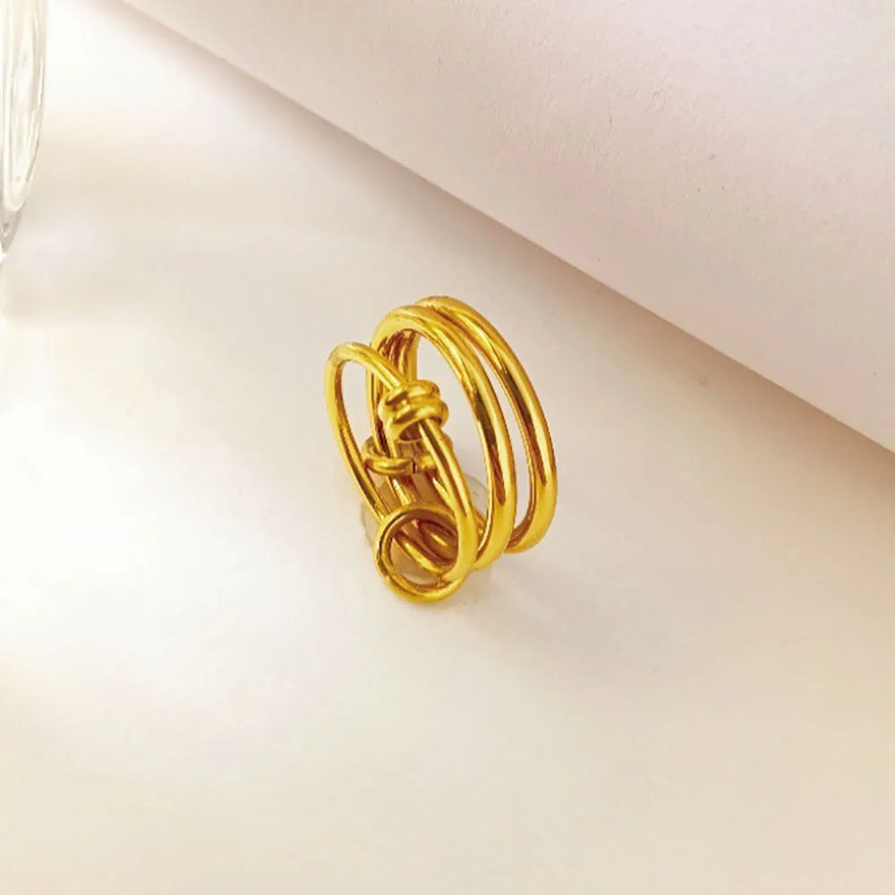 Sanhuan titanium steel ring geometric line design Trinity gold B398 on finger unisex size no 7