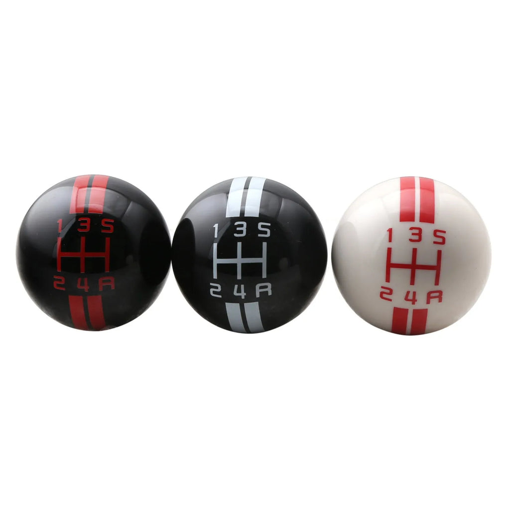 Black acrylic manual car gear shift knob with 5-speed and reverse markings, shown with three screw fittings.