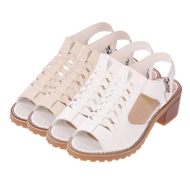 Women's black sandals with side zip and mid heel on a beef tendon sole.