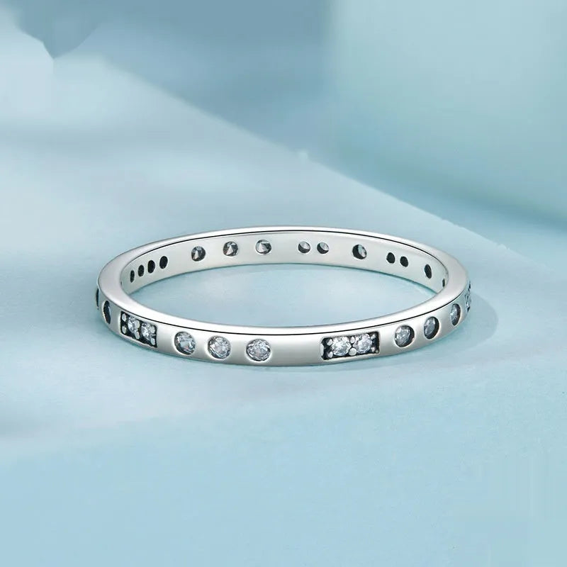 Moss Password I Love You silver alloy ring with oxidised black finish, shown in women's sizes.