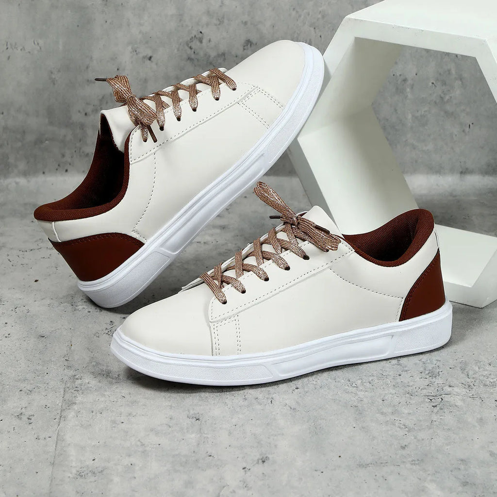 Women's platform skateboard sneaker in beige brown with cross strap and round toe design