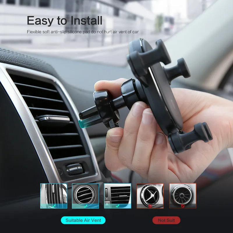 Black gravity car phone holder with 360-degree rotating head mounted on a car air vent.