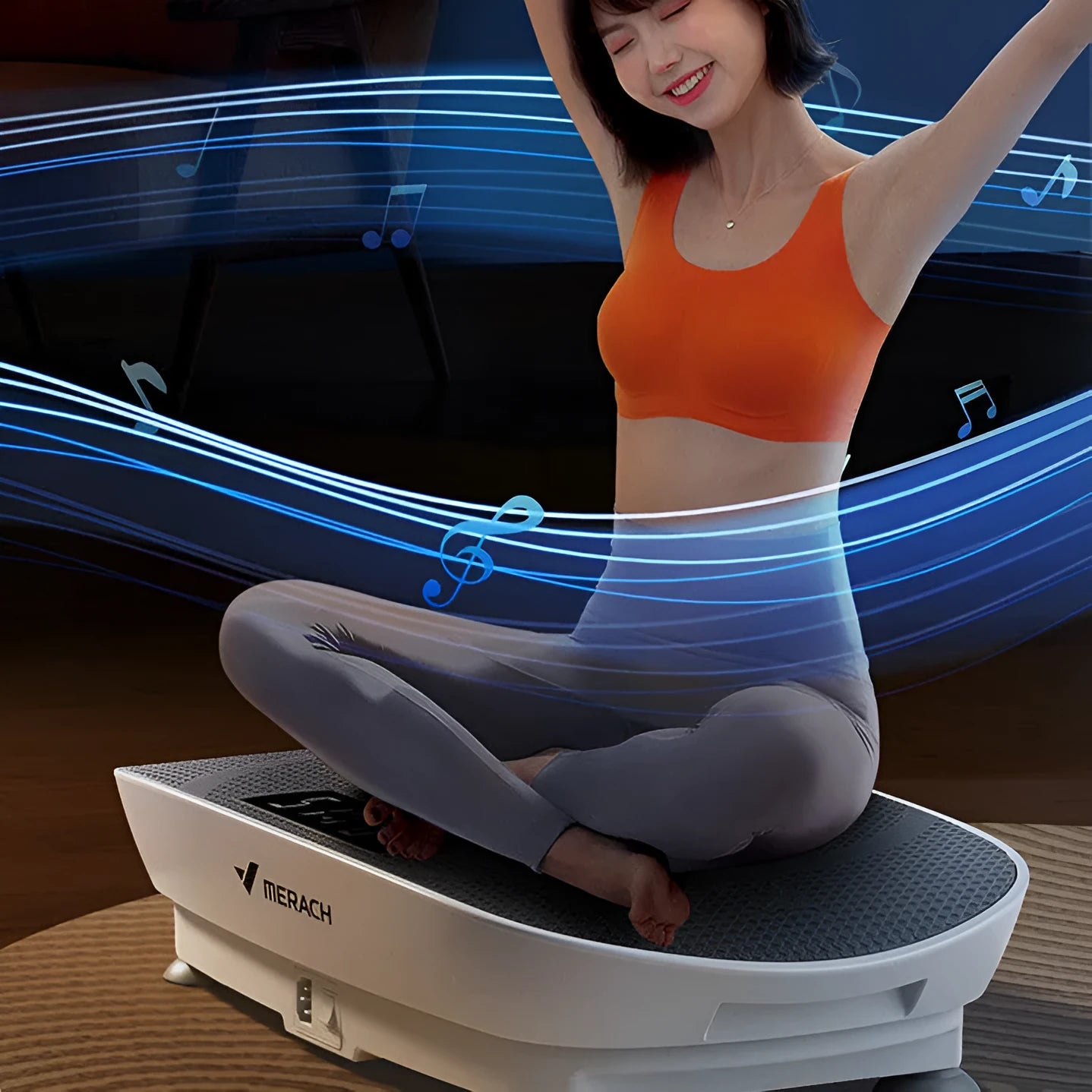 Grey portable smart power plate fat slinger on a home floor, showing its compact size and platform.