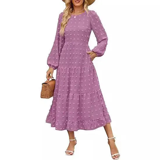 Women's beige high waist long sleeve dress with ruffled sleeves on a hanger.