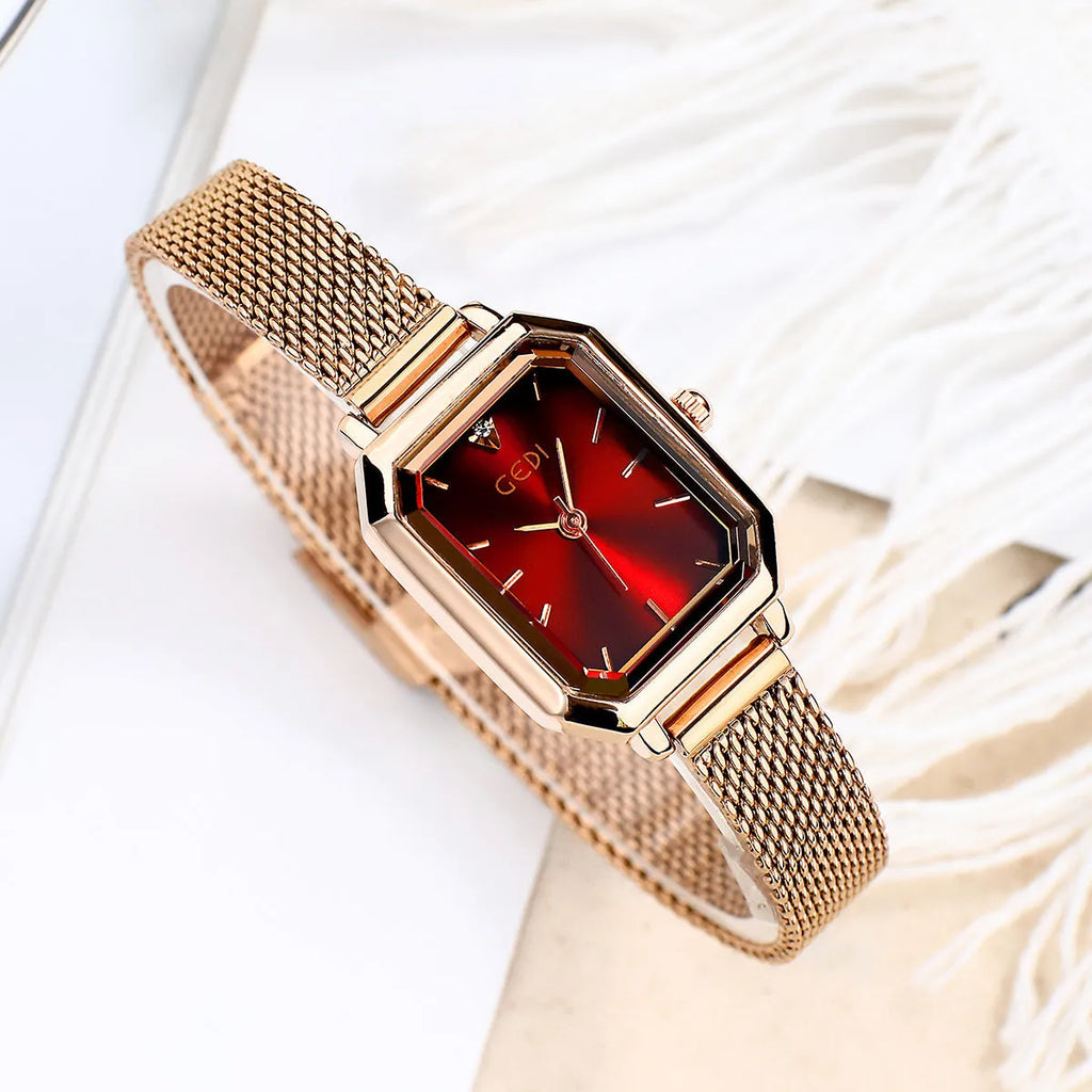 Women's square casual retro watch with rose gold shell and thin 8mm profile on wrist.