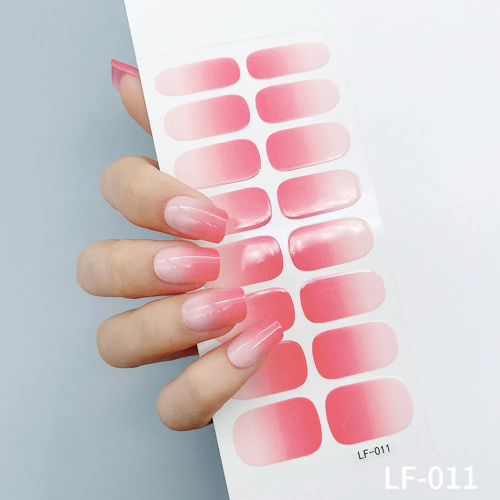 16 solid colour full nail art stickers with 22 patterns including cross, rose, butterfly designs in 12x6mm oval size