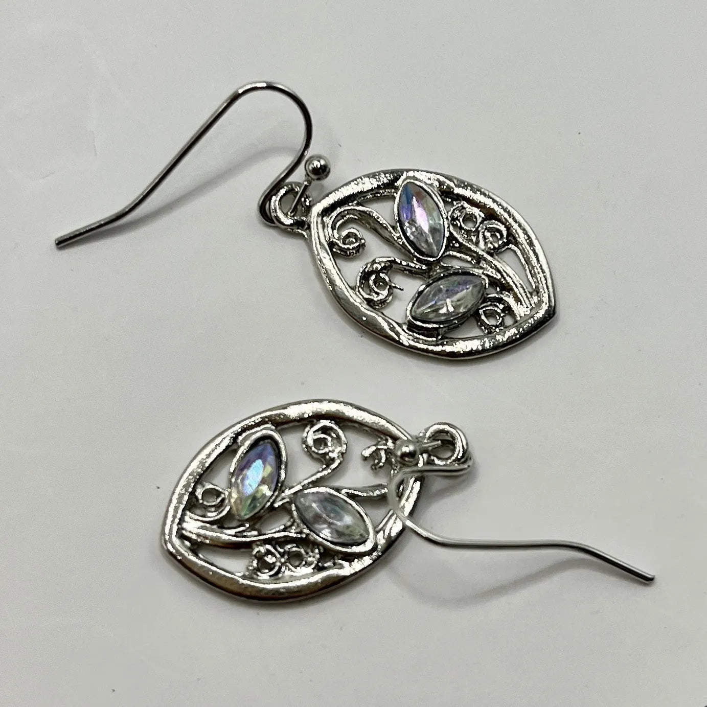 Silver leaf-shaped drop earrings with colourful moonstone centrepieces for women