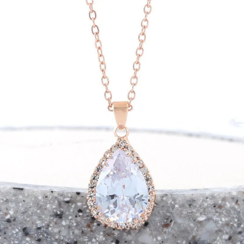 Women's drop-shaped rhinestone necklace in rose gold colour with geometric elements