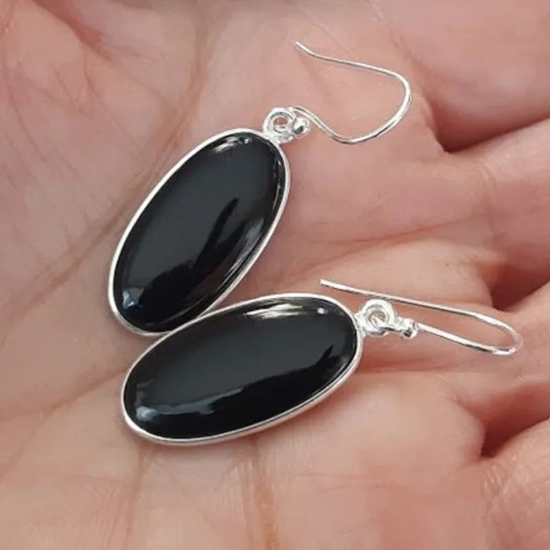 Women's geometric earrings with oval black agate pendant and electroplated silver-coloured finish