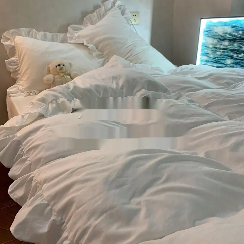 Mori style solid colour quilt cover and pillowcases from a four-piece washed cotton bedding set.