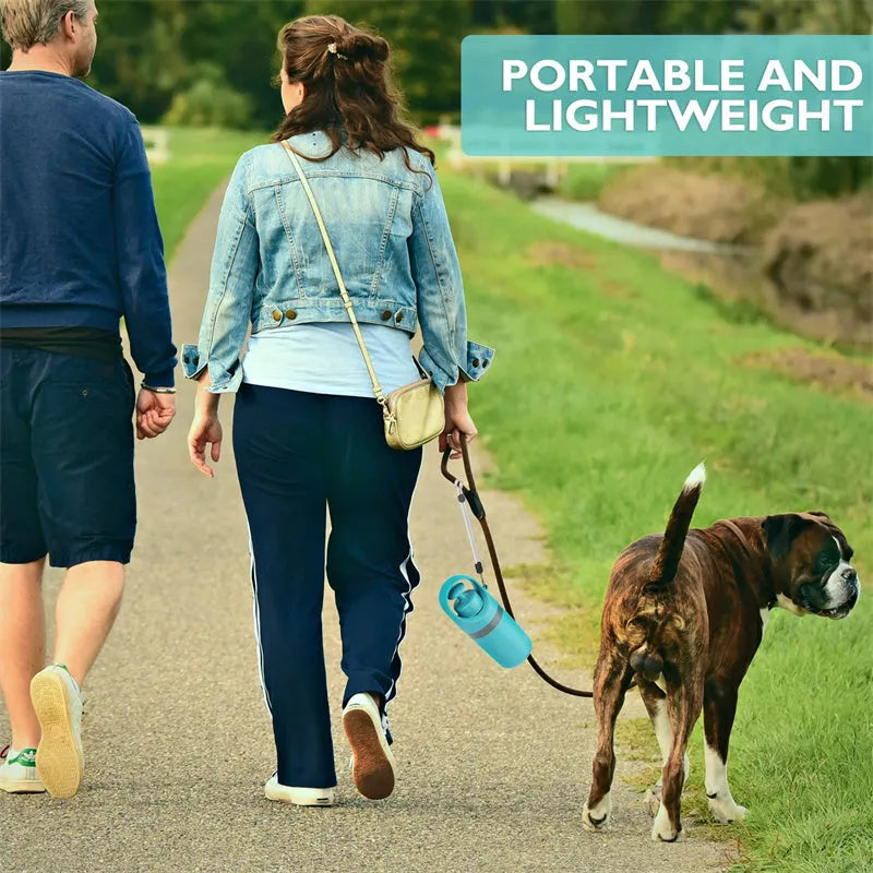 Blue portable dog pooper scooper with eight-claw shovel, built-in poop bag dispenser and lanyard