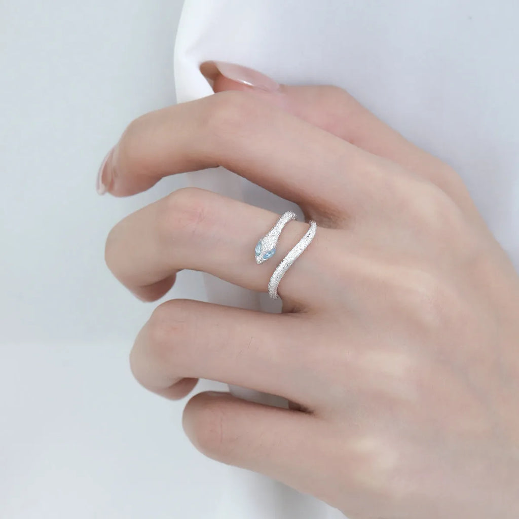 Adjustable silver snake ring with electroplated platinum colour finish and zodiac design