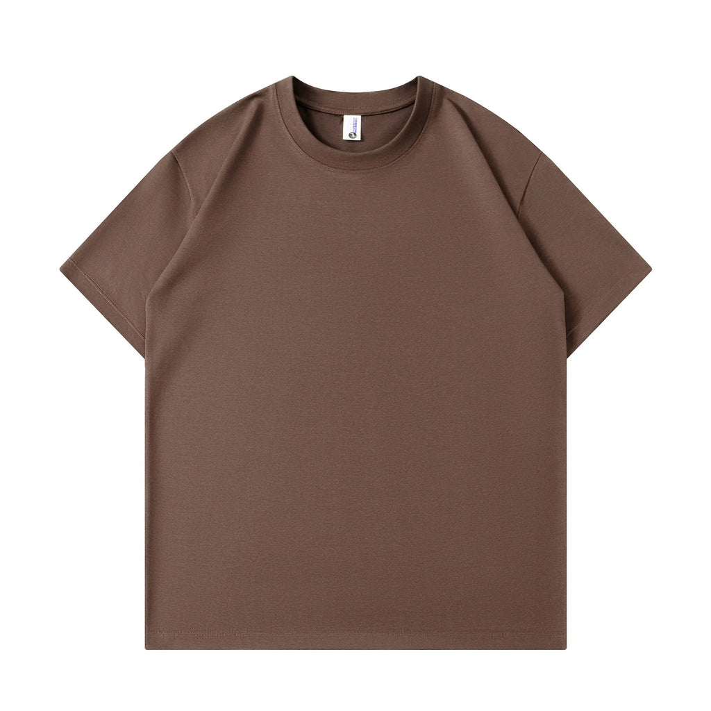 Unisex solid colour pure cotton loose fit short sleeve T-shirt in a leisure setting