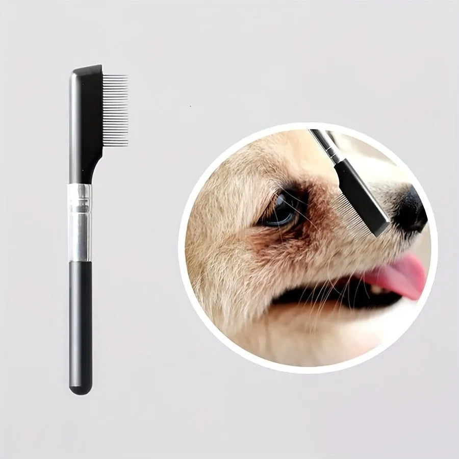 Black ambidextrous pet grooming brush with soft rubber bristles for gentle eye cleaning and hair removal on dogs and cats.