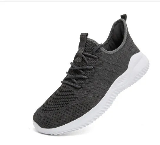 Men's black and white breathable mesh sneakers with round toe and lace-up design for casual sport.