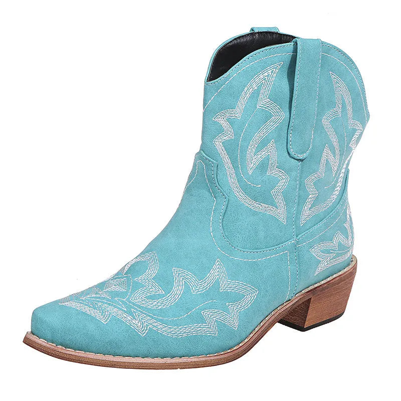 Women's blue embroidered Western ankle boots with a low wedge heel and pointed toe