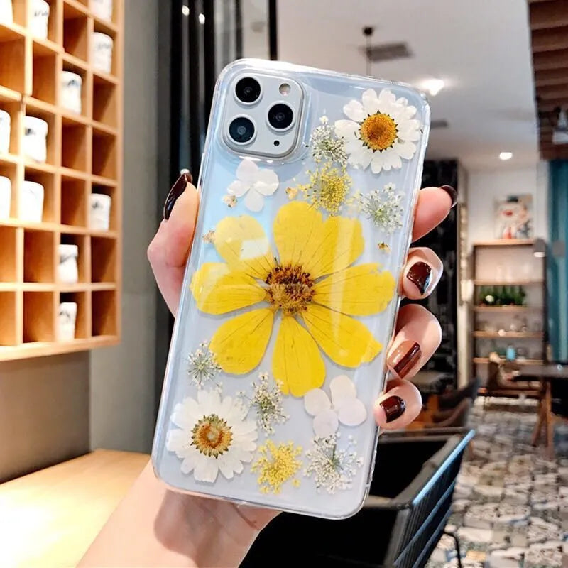 Floral iPhone case with large flower design on flexible TPU back cover in pink or yellow colour options