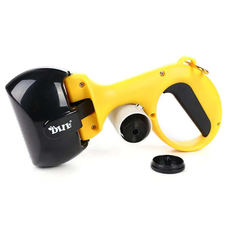 Yellow 2 in 1 portable pet toilet picker made from ABS plastic with curved hand grip and tooth-shaped notches on a white background