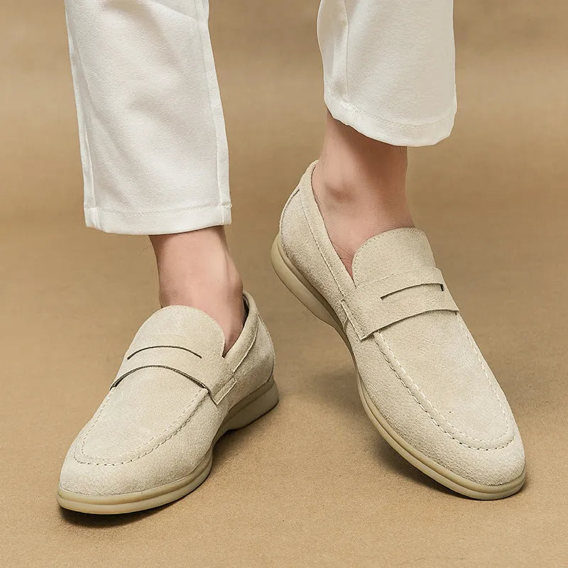 Men's black leather slip-on casual shoes with a round toe and rubber sole