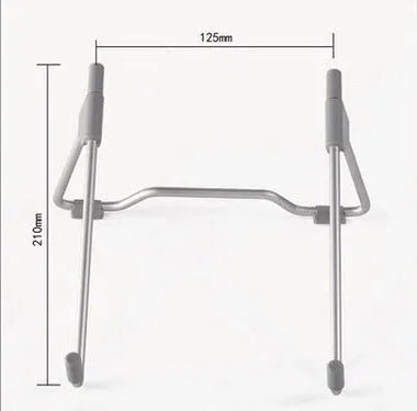 Grey aluminium alloy and plastic adjustable stand holding a mobile phone on a desk.