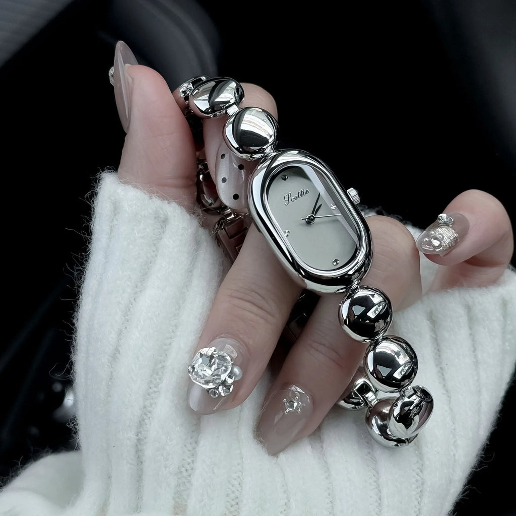 Women's oval metal bracelet watch 9mm thickness in platinum silver colour finish