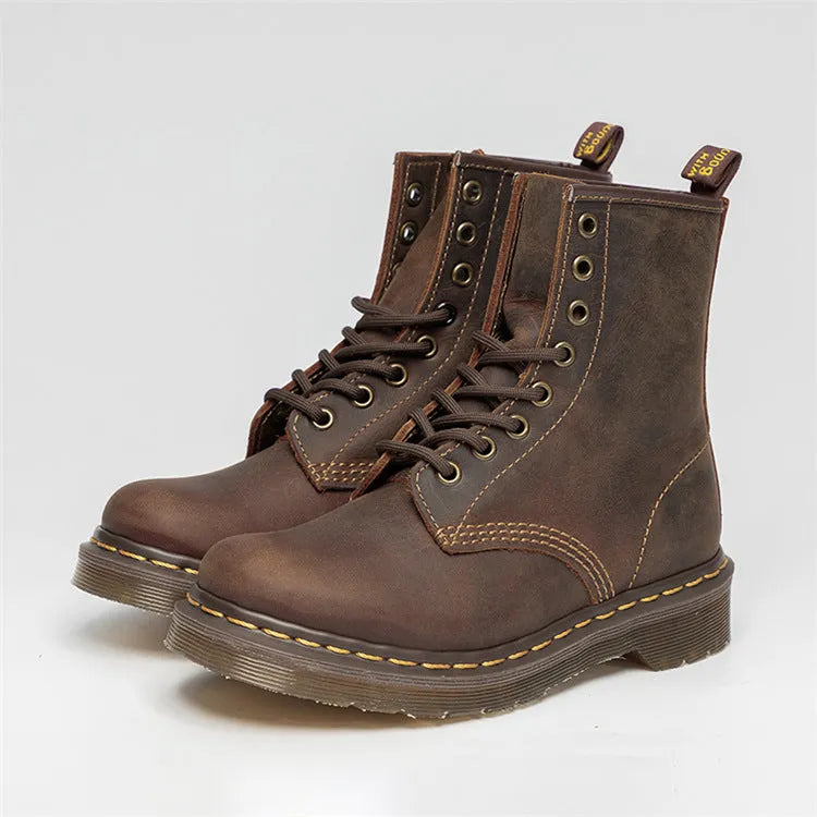 Crazy Horse leather Martin boots with round toe, wedge heel, and front lace-up closure on a white background
