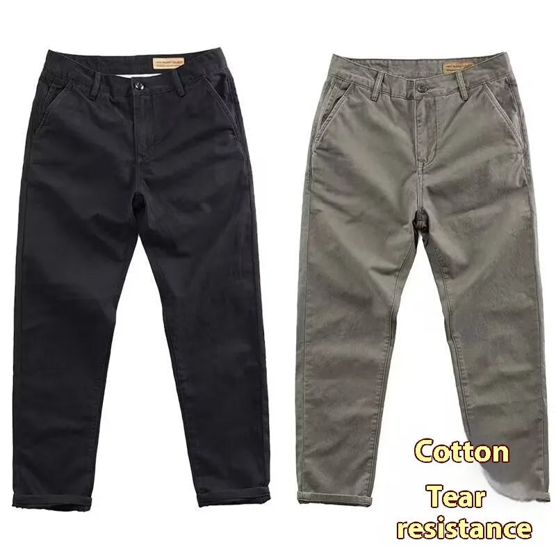 Men's slim fit casual trousers in a grey washed fabric with a straight leg.
