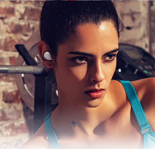 Black and white M18 true wireless Bluetooth earbuds with charging case.