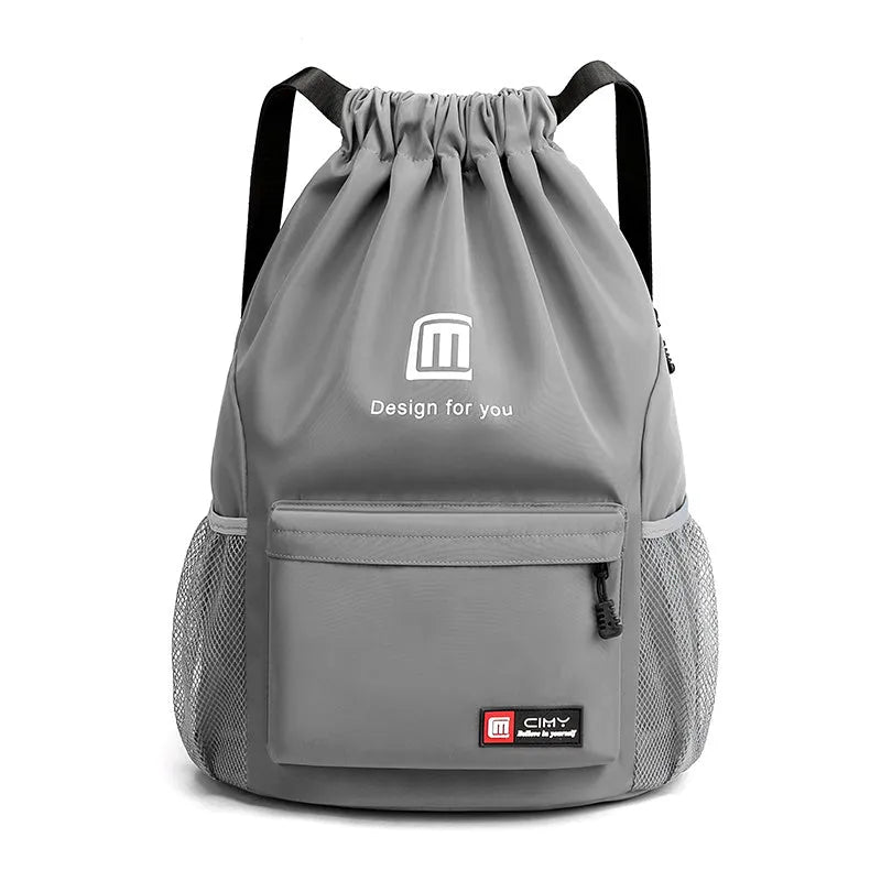Water-repellent Oxford travel backpack with drawstring closure in black colour showing bucket shape and double shoulder straps