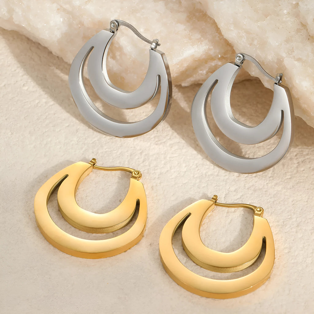 Geometric gold-plated French earrings with round ring elements, available in gold or steel colour