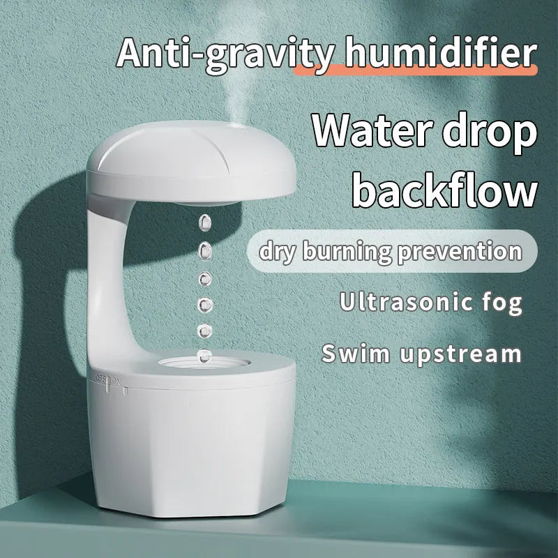 White portable 800ml USB humidifier with anti-gravity cool mist droplet effect for bedroom aromatherapy