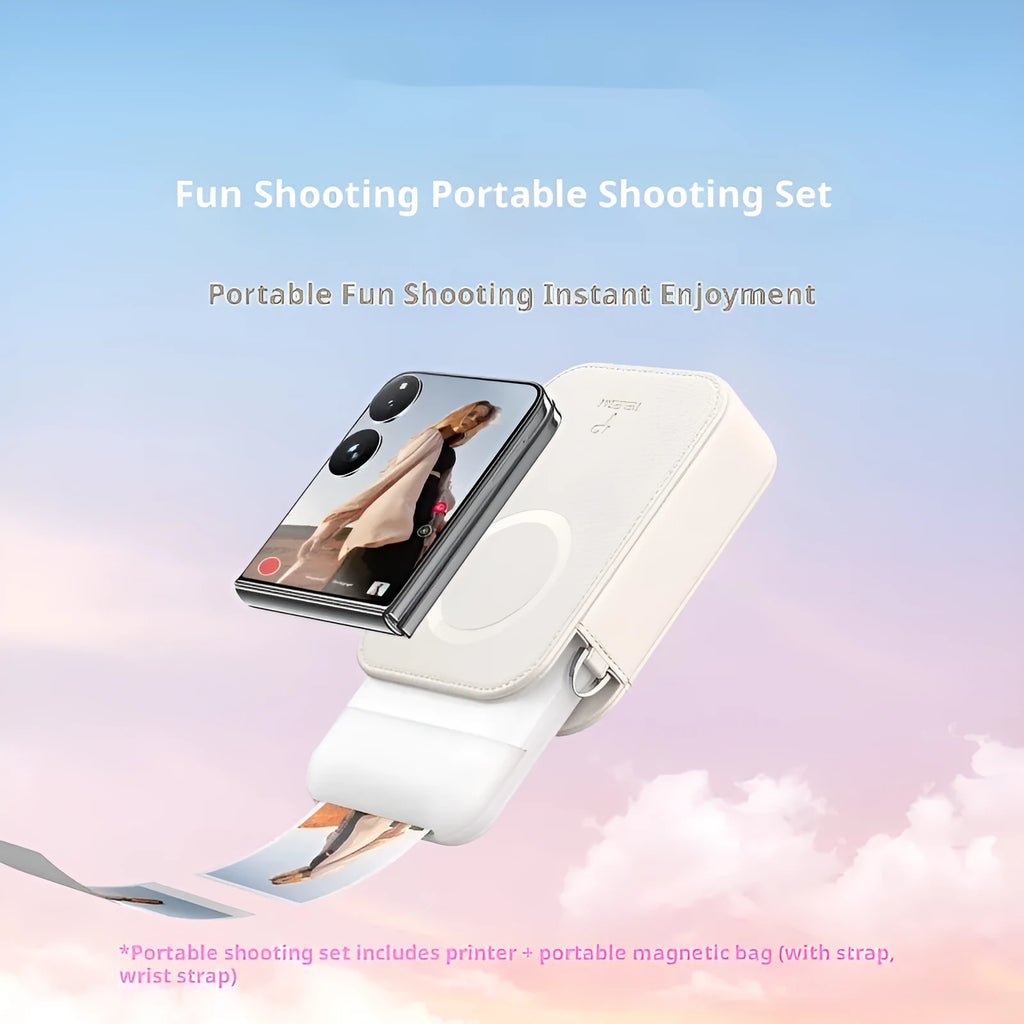 Pocket photo printer in plastic casing with carry-on bag and photo paper on table
