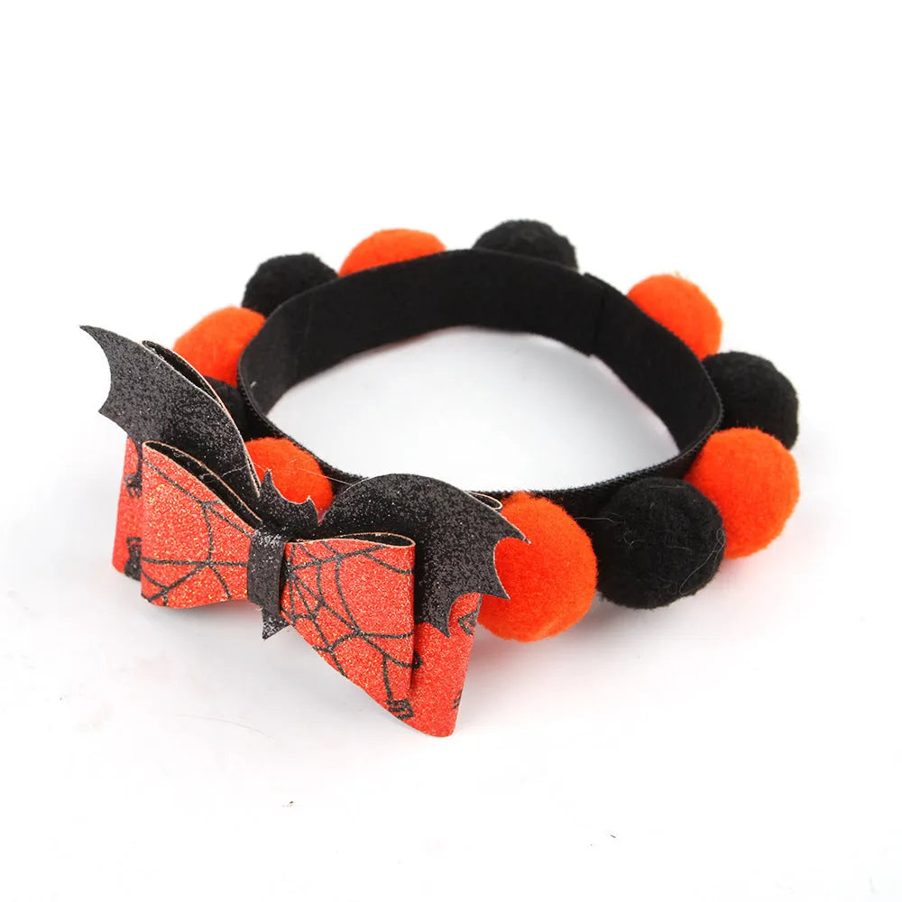 Halloween pet fur ball collar in pumpkin design with adjustable sizing