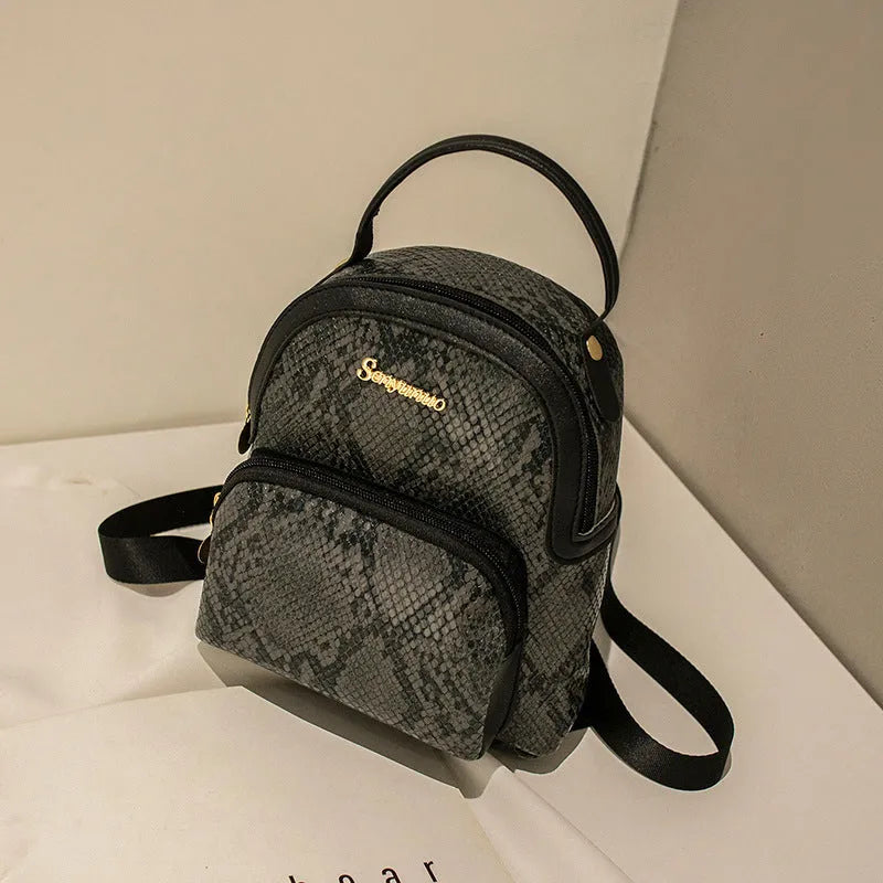 Girls' small PU backpack in Korean style with front pocket, in Snake White colour
