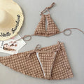 Brown seersucker women's lace-up bikini top with matching pants and skirt, a three-piece swimsuit set.