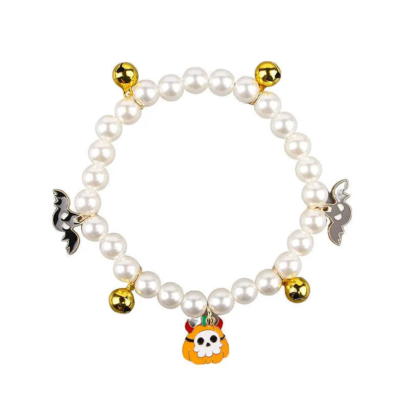 Halloween cat collar with simulated pearl necklace decoration in pumpkin-themed colours.