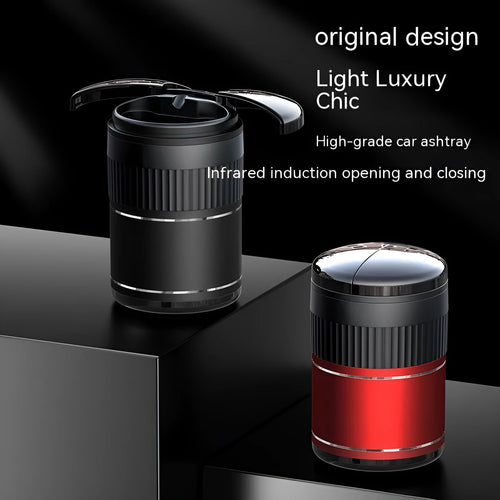 Black automatic sensing touch infrared metal car ashtray with lid on a car console.