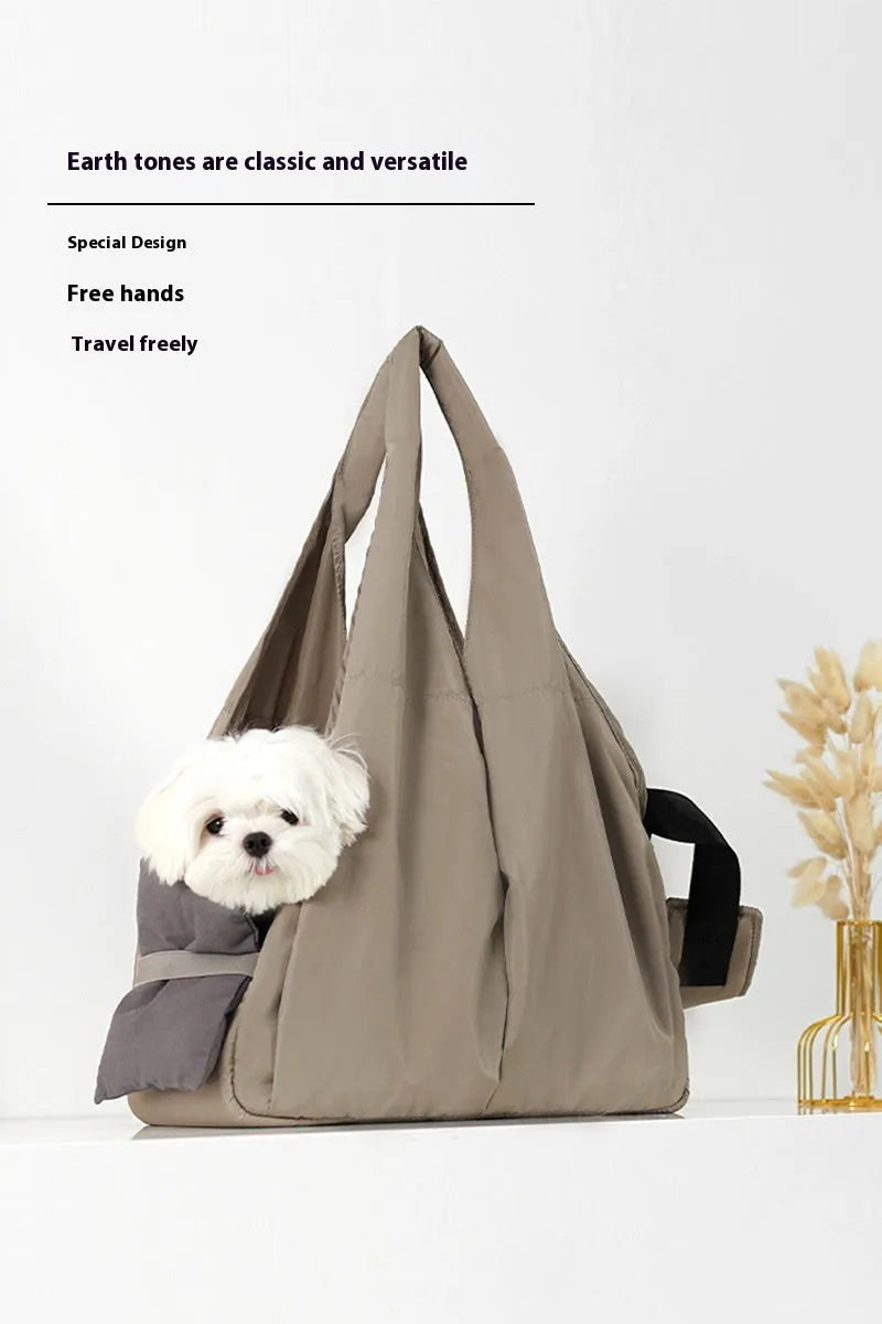 Apricot-coloured cloth pet handbag measuring 41x16x28cm with carrying handles