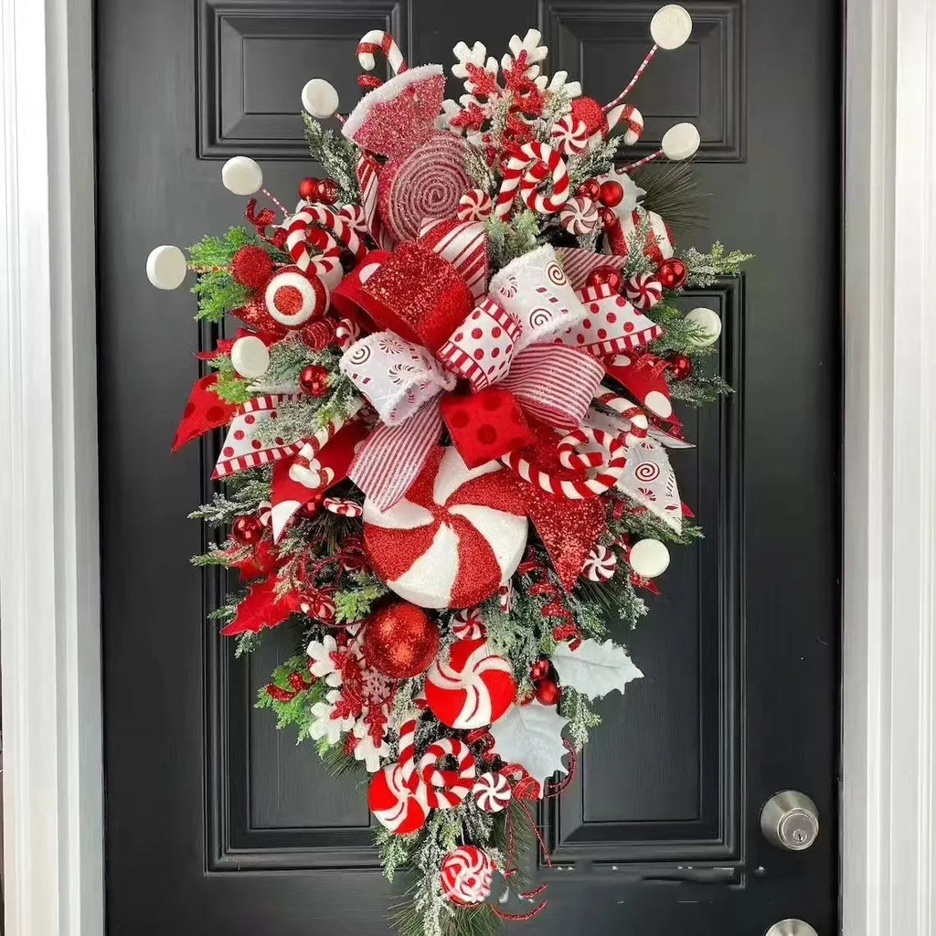 Artificial Christmas wreath with candy and upside-down tree design, 50cm or 60cm, yellow ribbon loops for hanging.