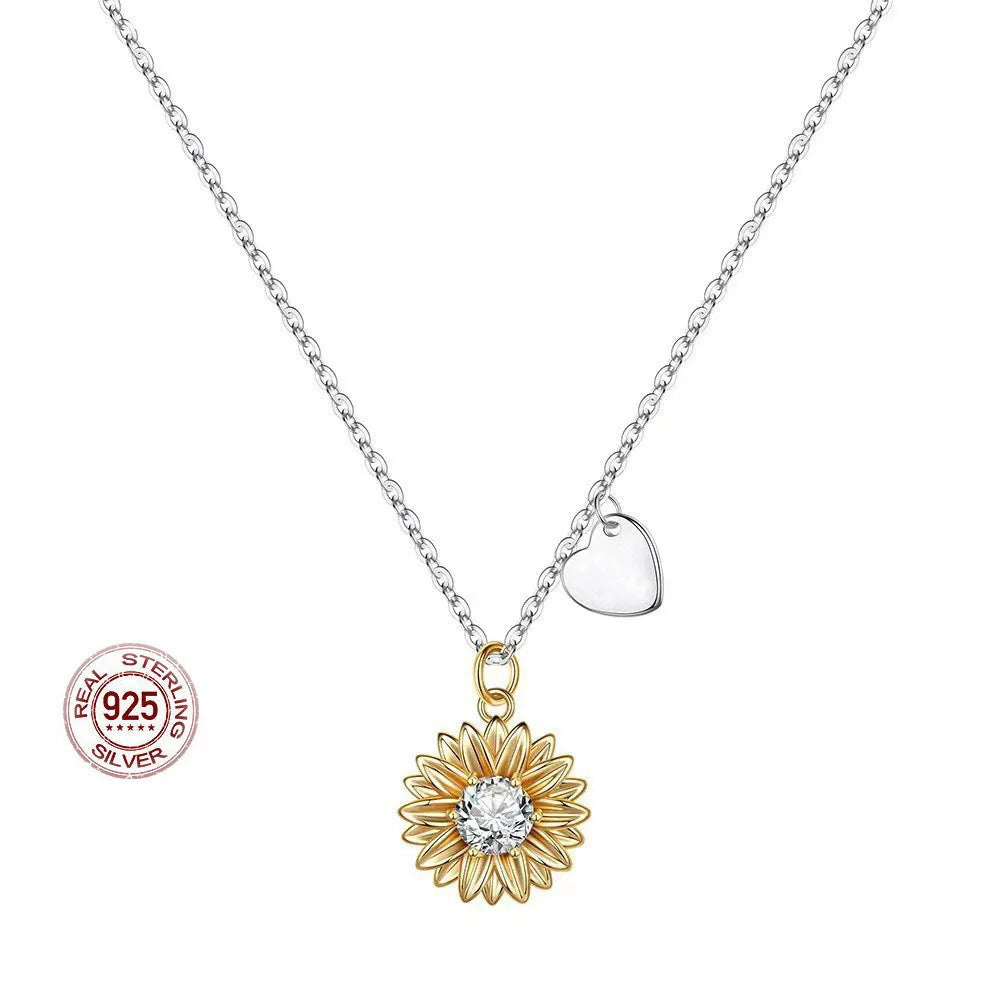 Women's adjustable 925 sterling silver necklace with sunflower geometric pendant on a cross chain.