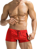Men's black high-waist swimming trunks with front lace-up detail and spandex lining.