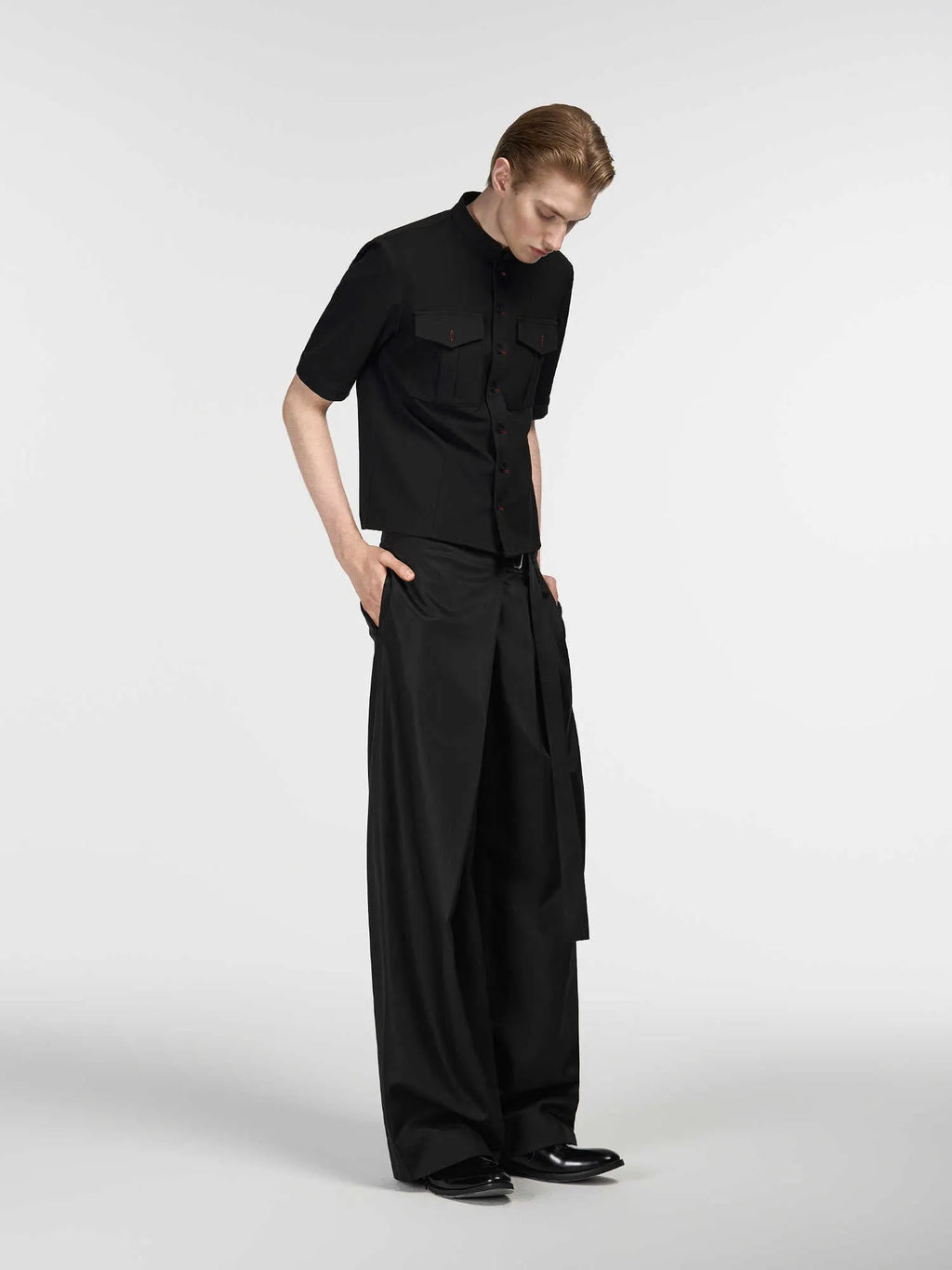 Black straight-leg trousers with adjustable waist and single pleat front in Tencel cotton blend fabric