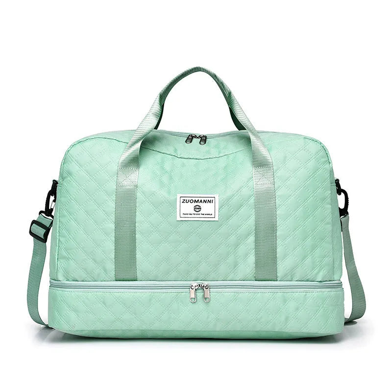 Large Oxford cloth travel bag in a solid colour showing its spacious design and street style details.