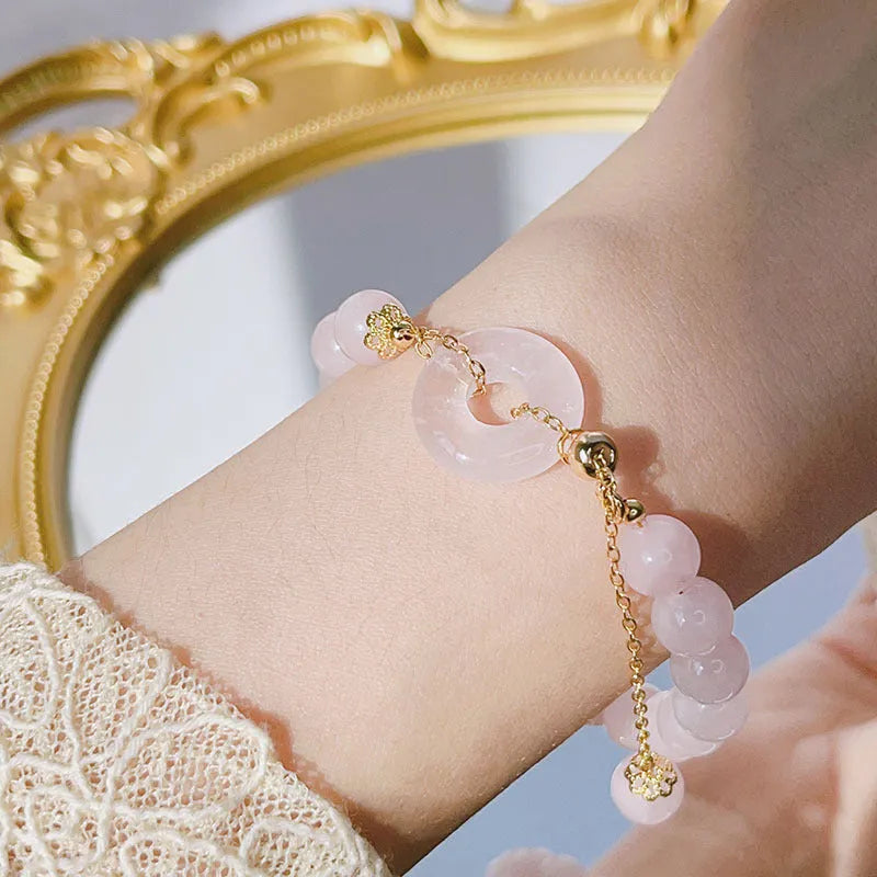 Pink crystal women's bracelet with peace buckle clasp and adjustable closure