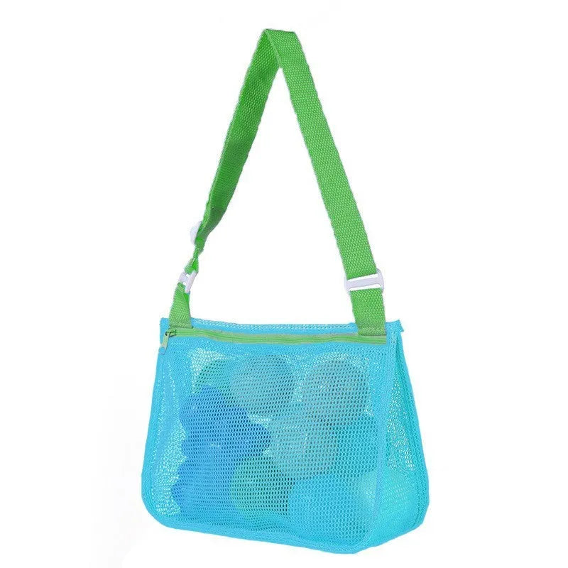 Blue nylon mesh travel storage bag with black handle and zip seal for children's clothing organisation