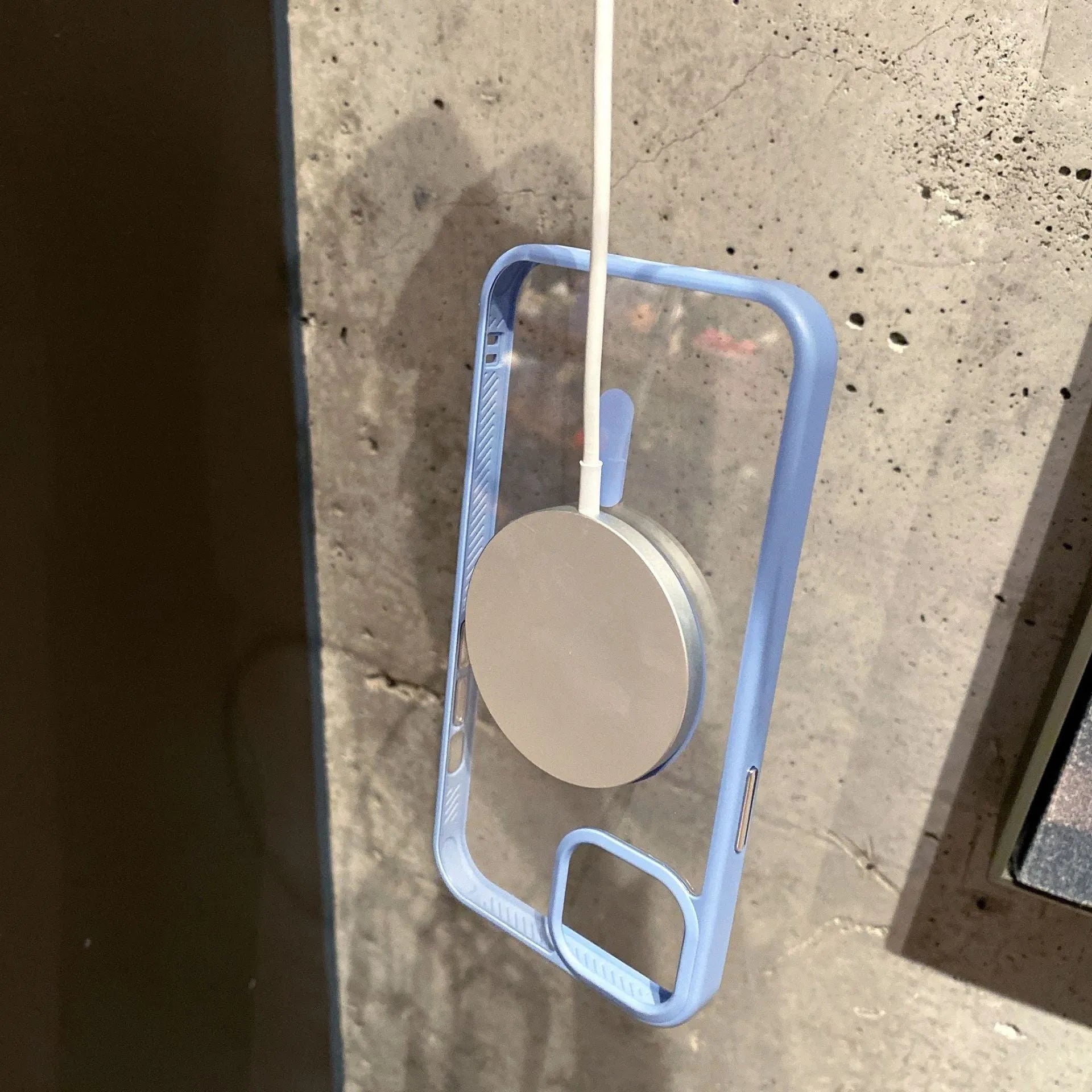 Transparent acrylic MagSafe phone case for iPhone showing magnetic ring and colour options