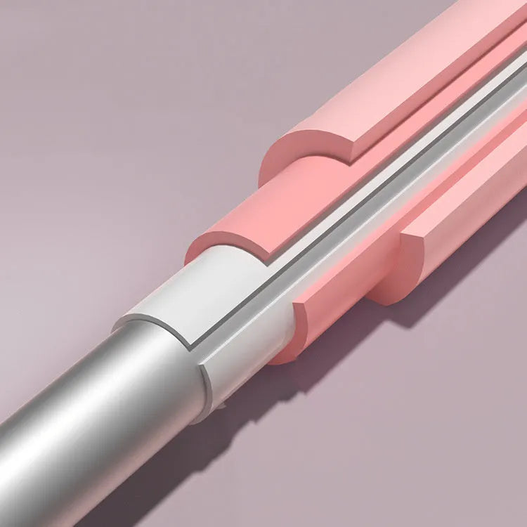 Adjustable yoga body stick in pink with foam grip on white background